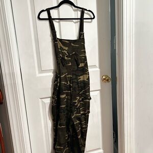 This product is a camouflage overalls in a XL in women’s
